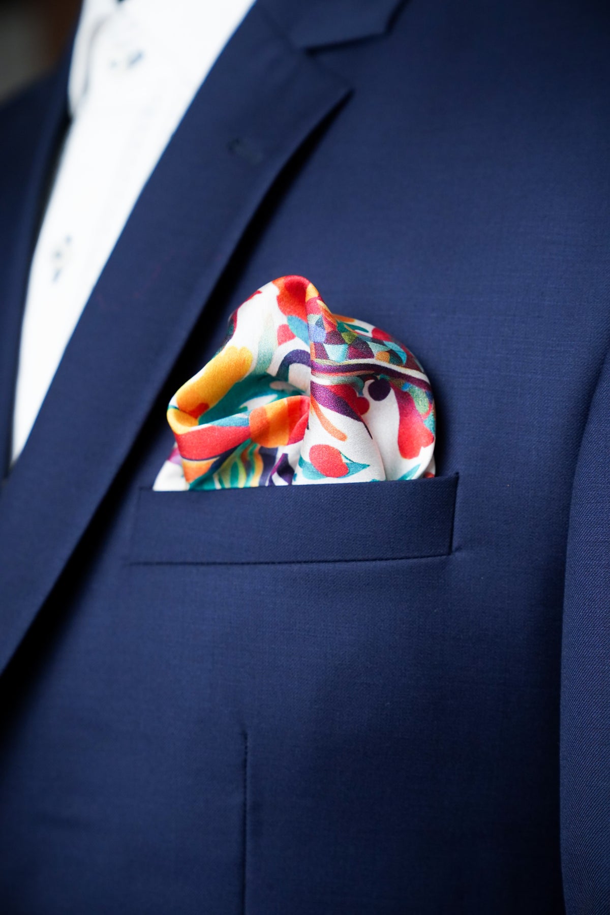 Florentine Fiesta Pocket Square with navy blue blazer